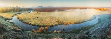 Fog over the river in the early morning on an autumn day. Nature of Ukraineの写真素材
