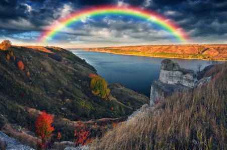 Rainbow over the river Dnister. Landscape with a rainbow in the sky. Nature of Ukraineの写真素材