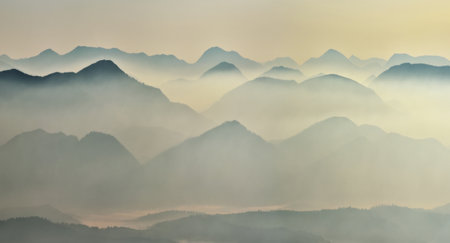 silhouettes of morning mountains. foggy morning in the Carpathians. Mountain landscapeの写真素材