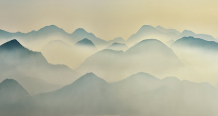silhouettes of morning mountains. foggy morning in the Carpathians. Mountain landscapeの写真素材