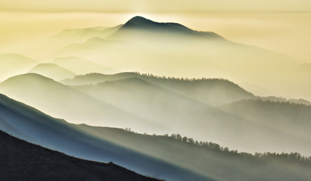 silhouettes of morning mountains. foggy morning in the Carpathians. Mountain landscapeの写真素材