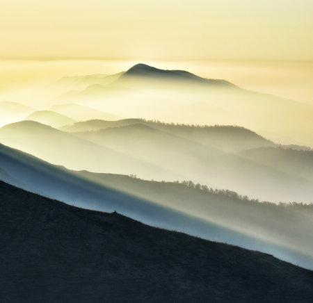 silhouettes of morning mountains. foggy morning in the Carpathians. Mountain landscapeの写真素材