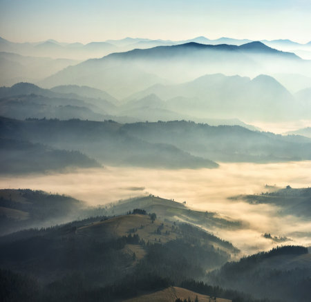 silhouettes of morning mountains. foggy morning in the Carpathians. Mountain landscapeの写真素材