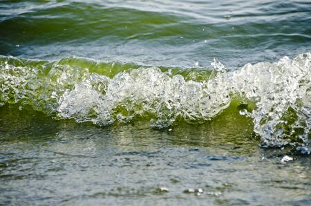 Sea water splashing waves on a beautiful natureの写真素材