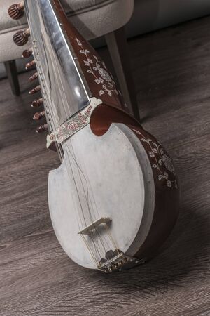 Beautiful musical object. Beautiful view of the antique Indian national stringed plucked musical...