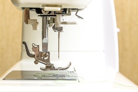 Close-up of modern sewing machine foot.の写真素材