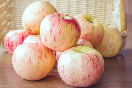 Ripe red apples on table close upの写真素材