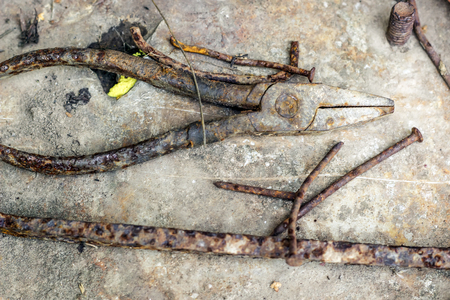 Rusty set of hand tools on a iron background. Vintage photoの写真素材