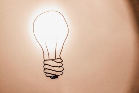 Painted lamp shines colored lightの写真素材