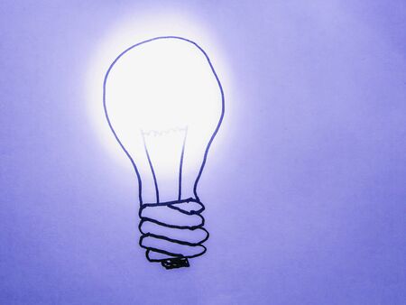 Painted lamp shines colored lightの写真素材