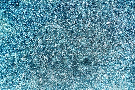 texture of frozen water drops cool ice glassの写真素材