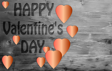 Happy Valentines day and heart on a wooden background.の写真素材