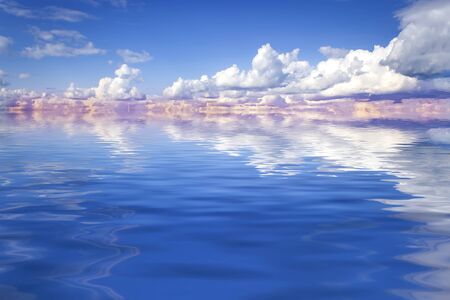 Blue sky with clouds over seaの写真素材
