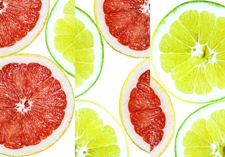 slices of lime and grapefruit isolated on a white backgroundの写真素材