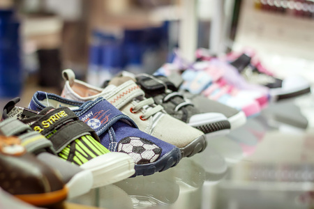 Counter with baby shoes at fashionable shopのeditorial素材