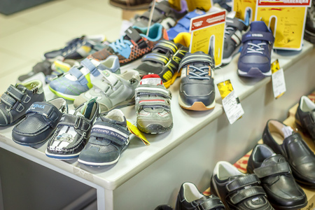 Counter with baby shoes at fashionable shopのeditorial素材