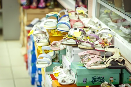 Counter with baby shoes at fashionable shopのeditorial素材