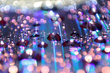 Multicolored water droplets close-up. Beautiful bokeh.の写真素材