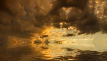 Colorful dramatic sky with cloud at sunsetの写真素材