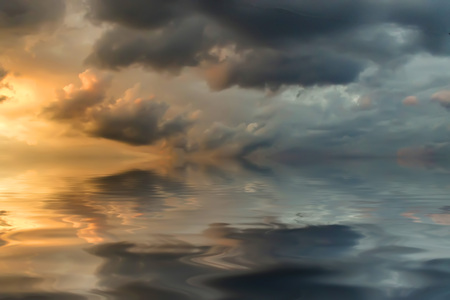 Colorful dramatic sky with cloud at sunsetの写真素材