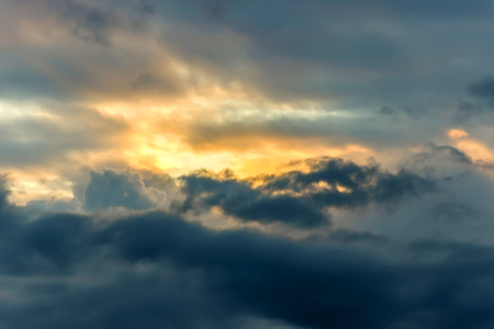Colorful dramatic sky with cloud at sunsetの写真素材