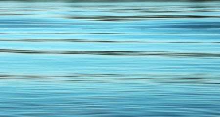 Waving blue water surfaceの写真素材