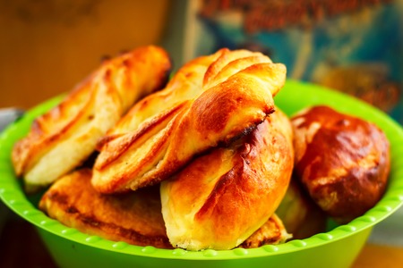 Traditional russian meat pies on plate, selective focus