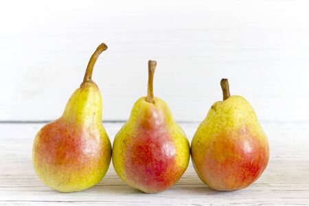 fresh pears on wooden backgroundの写真素材