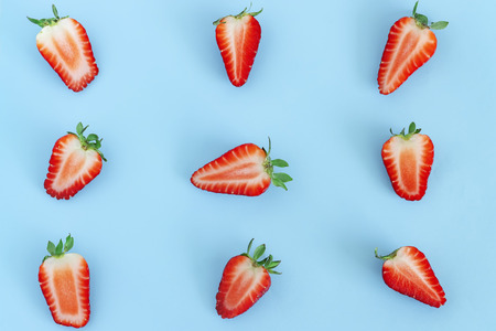 strawberry pattern on blue background, Summer concept. Flat lay, top view, squareの写真素材