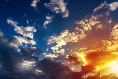 Dramatic sunset and sunrise sky with cloudsの写真素材