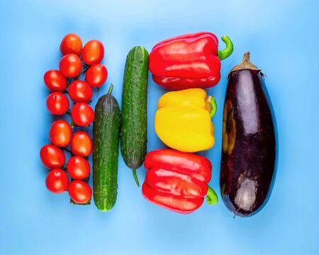 Food background of different vegetables on blue backgroundの写真素材