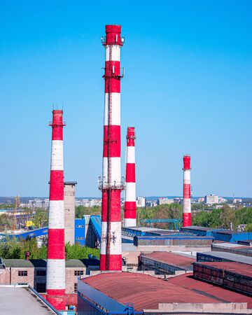 No smoke comes from the factory pipes. Stop production at the time of the coronavirus. Ecology concept.の写真素材