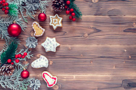 Christmas decoration with cookies on wooden background for Christmas holidays, top view.の写真素材