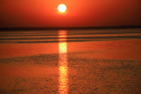 Beautiful summer sunset on the seaの写真素材