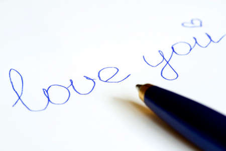 Pen lettering on paper love youの写真素材