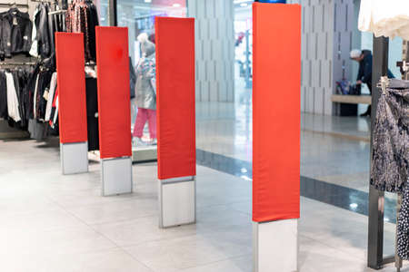 Red racks in the store for inscription for Saleの写真素材