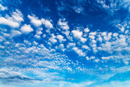 Blue sky with white clouds in sunny summer day.の写真素材