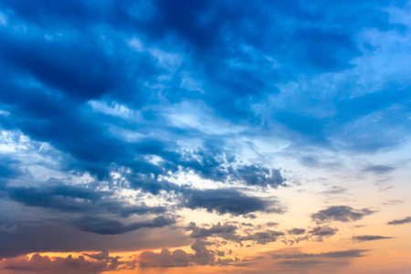 Sunset sky with multicolor clouds. Dramatic sky at sunsetの写真素材