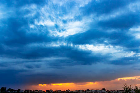 Sunset sky with multicolor clouds. Dramatic sky at sunsetの写真素材