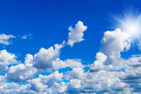 Blue sky with white clouds in sunny summer dayの写真素材