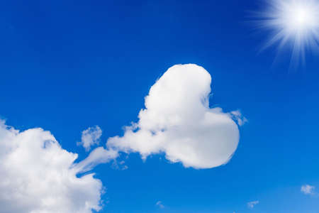 Cloud shaped heart on a sky. Concept love and romanticの写真素材