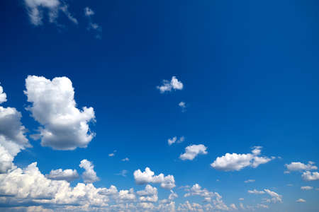 White clouds on blue sky on a sunny dayの写真素材