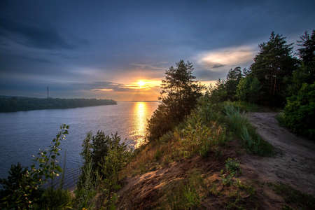 Summer sunset on the Volga river. Summer evening.の写真素材