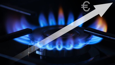 Gas price. Rise in gas prices in European Union. Blue gas flame and white arrow up with euro sign. The concept of rising gas or energy prices.の写真素材