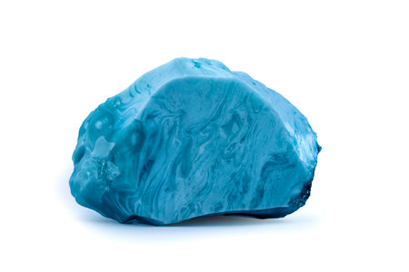 Blue crystal mineral stone on isolated white background. Mineral crystals in the natural environment.の写真素材