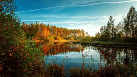 Lake on an autumn evening. Autumn landscape. Background for relax.の写真素材