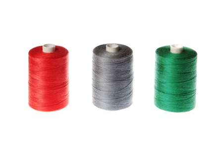 spool of thread. green, blue, red.の写真素材