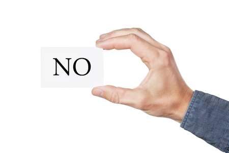 Card in hand that says, Noの写真素材