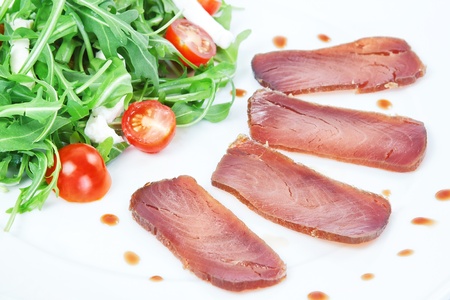 The composition of the slices of smoked tuna.の写真素材
