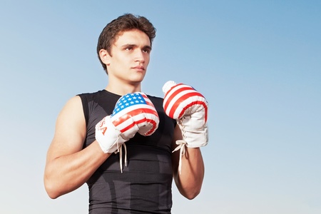 American sportsman boxer with gloves の写真素材